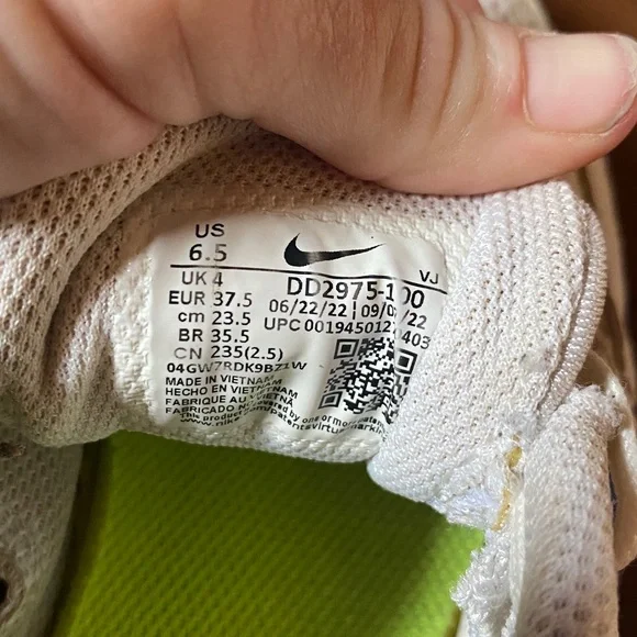 Nike White Sneakers with Pink, Blue, and Yellow Accents - Picture 2 of 3